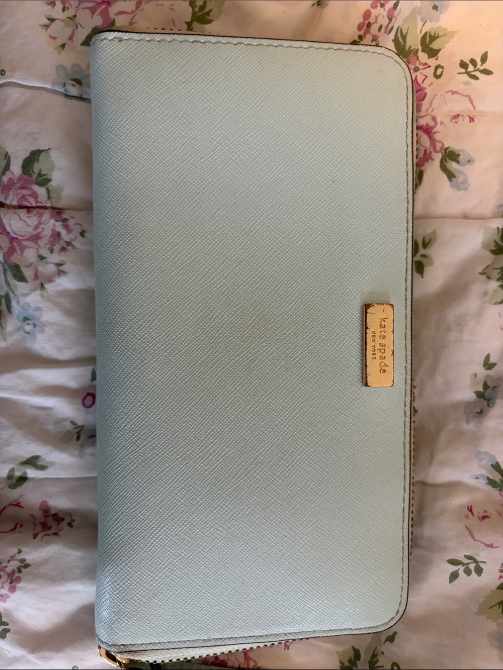 kate spade pastel blue zip-around wallet with gold plaque